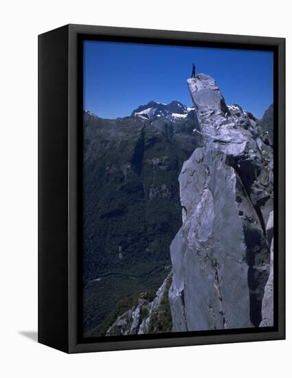 Climber on the Summit of a Rock Tower, Chile-Pablo Sandor-Framed Stretched Canvas