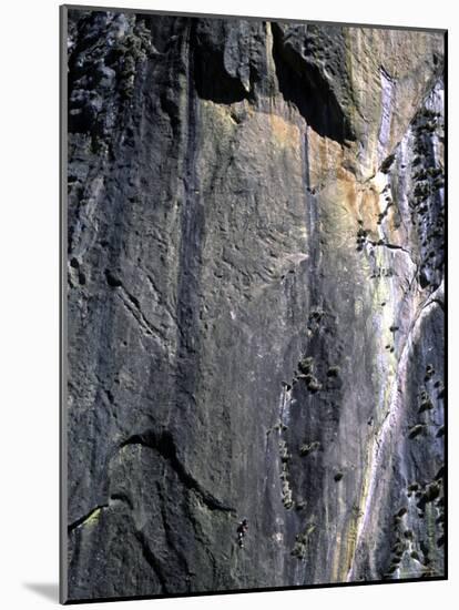 Climber Perched on Large Rock Wall, Madagascar-Michael Brown-Mounted Photographic Print