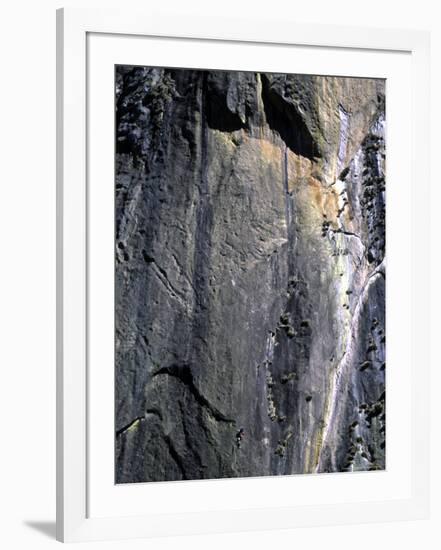 Climber Perched on Large Rock Wall, Madagascar-Michael Brown-Framed Photographic Print