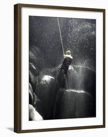 Climber Showered with Water in Cave, Mexico-Michael Brown-Framed Photographic Print