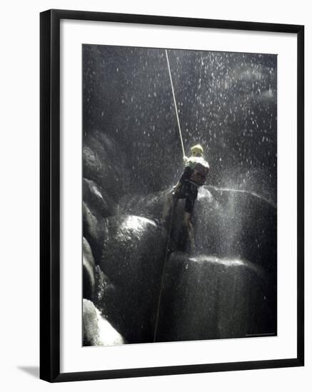 Climber Showered with Water in Cave, Mexico-Michael Brown-Framed Photographic Print