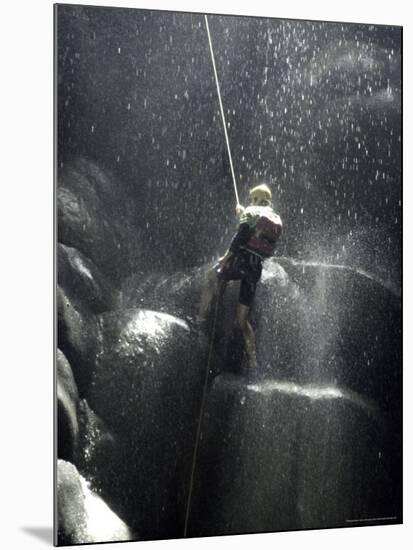 Climber Showered with Water in Cave, Mexico-Michael Brown-Mounted Photographic Print