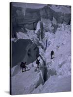 Climbers Crossing Ladder on Everest, Nepal-Michael Brown-Stretched Canvas