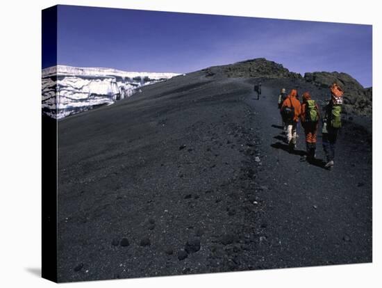 Climbers Heading up a Rocky Trail, Kilimanjaro-Michael Brown-Stretched Canvas