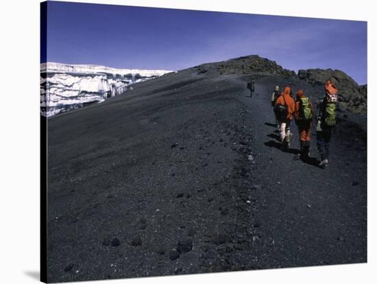 Climbers Heading up a Rocky Trail, Kilimanjaro-Michael Brown-Stretched Canvas