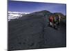 Climbers Heading up a Rocky Trail, Kilimanjaro-Michael Brown-Mounted Photographic Print