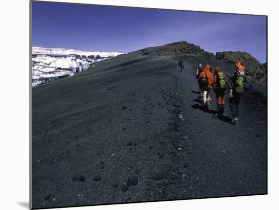 Climbers Heading up a Rocky Trail, Kilimanjaro-Michael Brown-Mounted Photographic Print