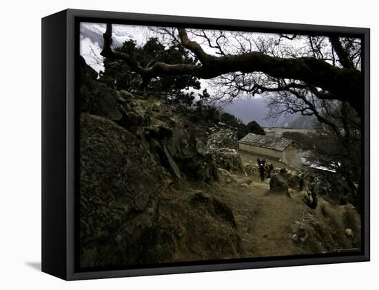 Climbers Hiking Through Small Mountain Village, Nepal-David D'angelo-Framed Stretched Canvas