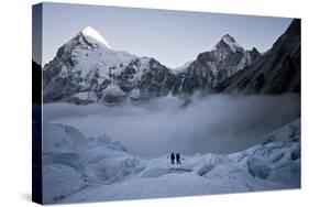Climbers Navigate the Khumbu Icefall with Pumori and Lingtrin in the Background in Nepal-Kent Harvey-Stretched Canvas