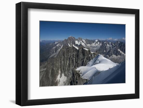 Climbers on a snowfield approaching the Aiguile du Midi, 3842m, Graian Alps, Chamonix, Haute Savoie-James Emmerson-Framed Photographic Print