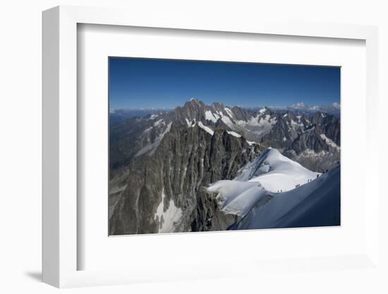 Climbers on a snowfield approaching the Aiguile du Midi, 3842m, Graian Alps, Chamonix, Haute Savoie-James Emmerson-Framed Photographic Print
