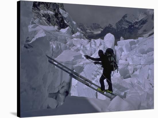 Climbing Across Ladder on Everest, Nepal-Michael Brown-Stretched Canvas