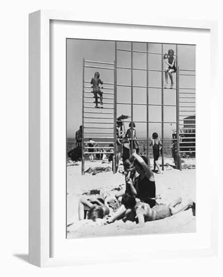 Climbing Frames on the Beach and a Family on Holiday in Warnemunde, Germany in 1936-Robert Hunt-Framed Photographic Print