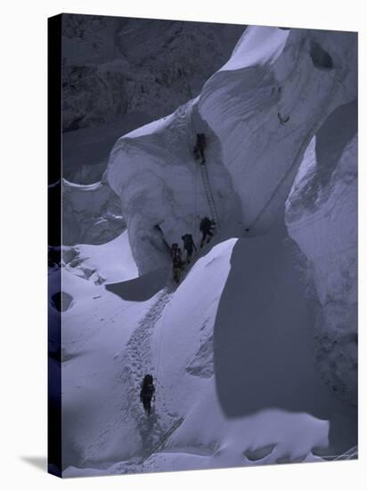 Climbing Khumbu Ice Fall, Nepal-Michael Brown-Stretched Canvas