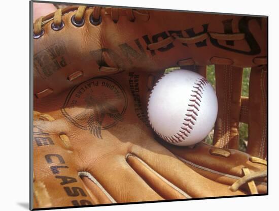 Close-up of a Baseball in a Glove-null-Mounted Premium Photographic Print