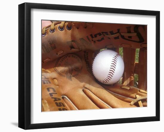 Close-up of a Baseball in a Glove-null-Framed Photographic Print