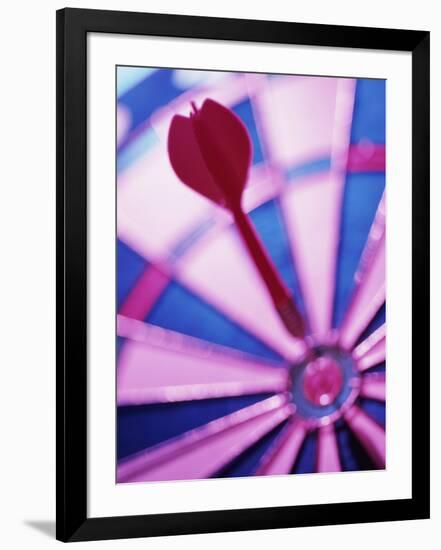 Close-up of a Dart in the Bull's-Eye of a Dartboard-null-Framed Photographic Print