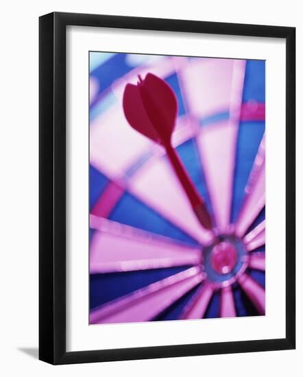 Close-up of a Dart in the Bull's-Eye of a Dartboard-null-Framed Photographic Print