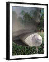 Close-up of a Golf Club Hitting a Golf Ball on a Tee-null-Framed Premium Photographic Print