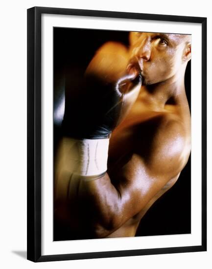 Close-up of a Male Boxer Wearing Boxing Gloves-null-Framed Premium Photographic Print