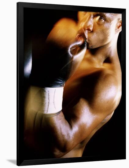 Close-up of a Male Boxer Wearing Boxing Gloves-null-Framed Photographic Print
