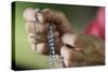 Close-up of a man's hands praying the rosary, France, Europe-Godong-Stretched Canvas