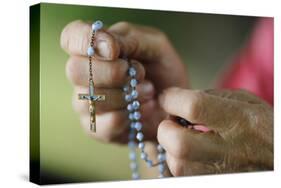 Close-up of a man's hands praying the rosary, France, Europe-Godong-Stretched Canvas