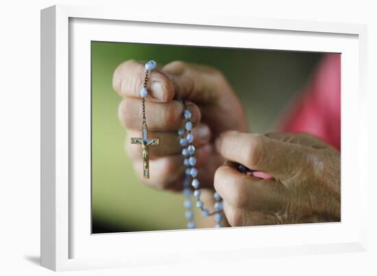 Close-up of a man's hands praying the rosary, France, Europe-Godong-Framed Photographic Print