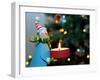 Close-Up of a Snow Man Candle in Front of a Tree with Christmas Lights-Winfred Evers-Framed Premium Photographic Print