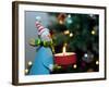 Close-Up of a Snow Man Candle in Front of a Tree with Christmas Lights-Winfred Evers-Framed Photographic Print