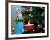 Close-Up of a Snow Man Candle in Front of a Tree with Christmas Lights-Winfred Evers-Framed Photographic Print