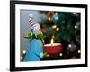 Close-Up of a Snow Man Candle in Front of a Tree with Christmas Lights-Winfred Evers-Framed Photographic Print