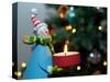 Close-Up of a Snow Man Candle in Front of a Tree with Christmas Lights-Winfred Evers-Stretched Canvas