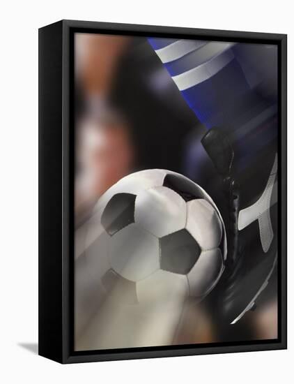 Close-up of a Soccer Player Kicking a Soccer Ball-null-Framed Stretched Canvas