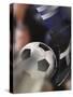 Close-up of a Soccer Player Kicking a Soccer Ball-null-Stretched Canvas
