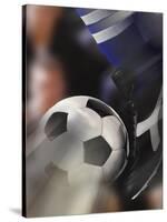 Close-up of a Soccer Player Kicking a Soccer Ball-null-Stretched Canvas