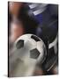 Close-up of a Soccer Player Kicking a Soccer Ball-null-Stretched Canvas