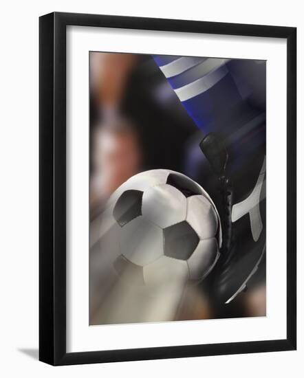Close-up of a Soccer Player Kicking a Soccer Ball-null-Framed Premium Photographic Print