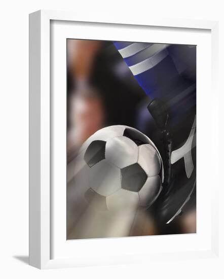 Close-up of a Soccer Player Kicking a Soccer Ball-null-Framed Premium Photographic Print