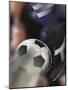 Close-up of a Soccer Player Kicking a Soccer Ball-null-Mounted Photographic Print
