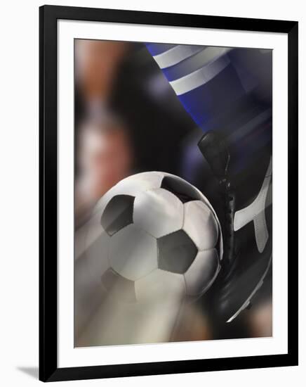 Close-up of a Soccer Player Kicking a Soccer Ball-null-Framed Photographic Print