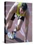Close-up of a Young Man in the Starting Position on a Running Track-null-Stretched Canvas