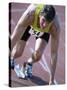 Close-up of a Young Man in the Starting Position on a Running Track-null-Stretched Canvas