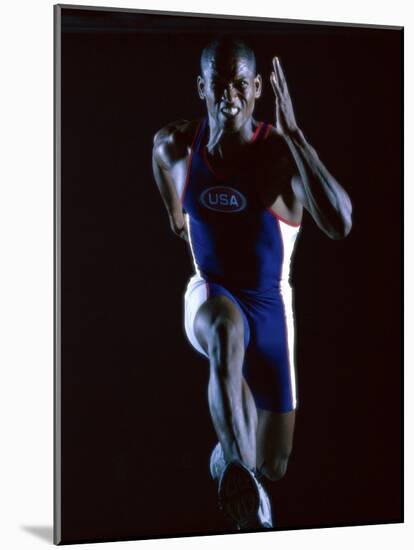 Close-up of a Young Man Running-null-Mounted Photographic Print