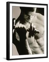 Close-up of a Young Man Working Out with a Dumbbell-null-Framed Premium Photographic Print