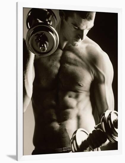 Close-up of a Young Man Working Out with Dumbbells-null-Framed Photographic Print