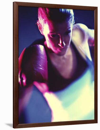 Close-up of a Young Woman Wearing Boxing Gloves-null-Framed Photographic Print