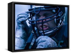 Close-up of an American Football Player Wearing a Helmet-null-Framed Stretched Canvas