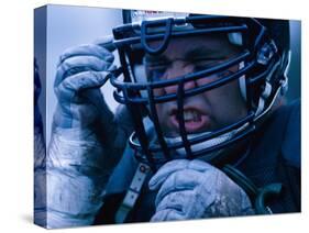 Close-up of an American Football Player Wearing a Helmet-null-Stretched Canvas