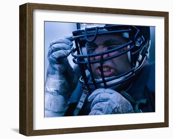 Close-up of an American Football Player Wearing a Helmet-null-Framed Photographic Print